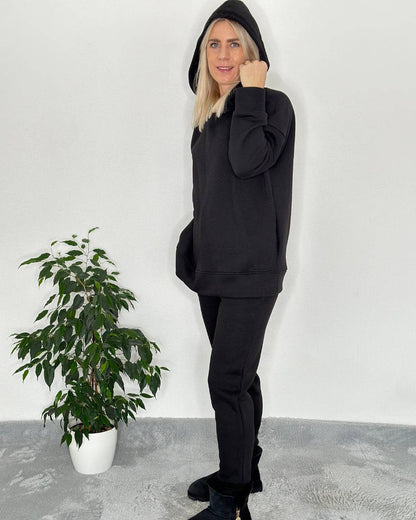 Damen Oversized Winter Outfit Set Damen Langarm Oversized Kapuzenpullover Hoodie gefüttert mit Taschen an der Seite und breiten Bündchen Ärmel in Einheitsgröße von XS bis M mit Damen Jogginghosen Schwarz